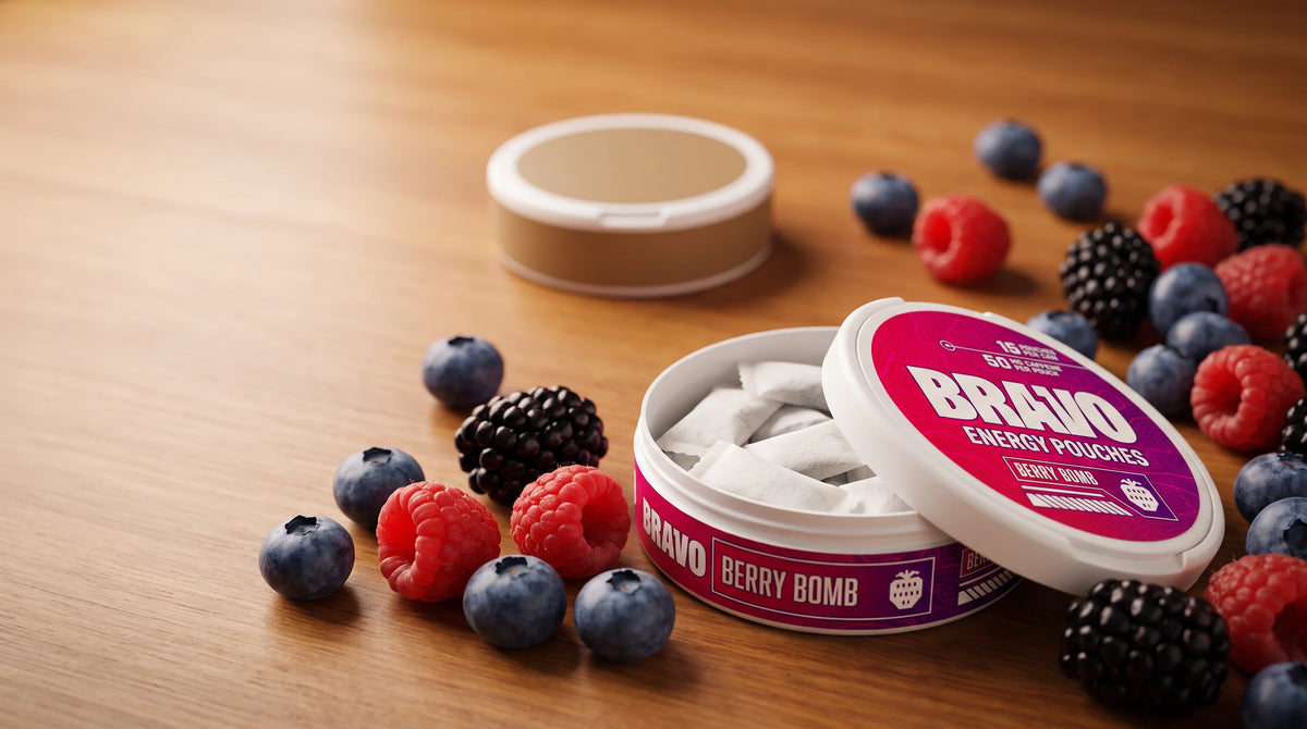 Bravo Berry Bomb caffeine pouch can with fresh berries, compared against a generic competitor pouch tin in the background