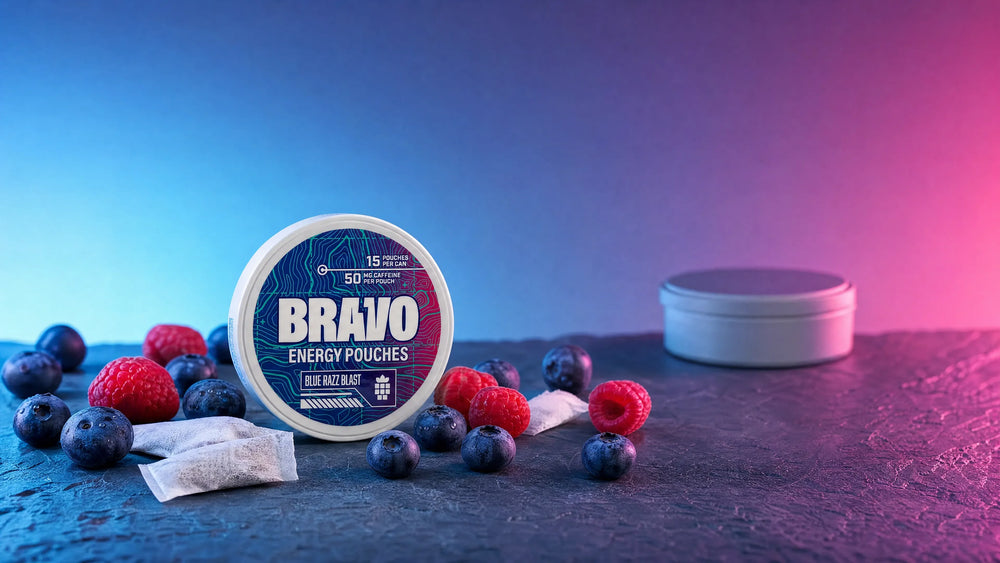 Bravo Blue Razz Blast caffeine pouch can in sharp focus with blueberries and raspberries, one generic unbranded competitor tin blurred in the background