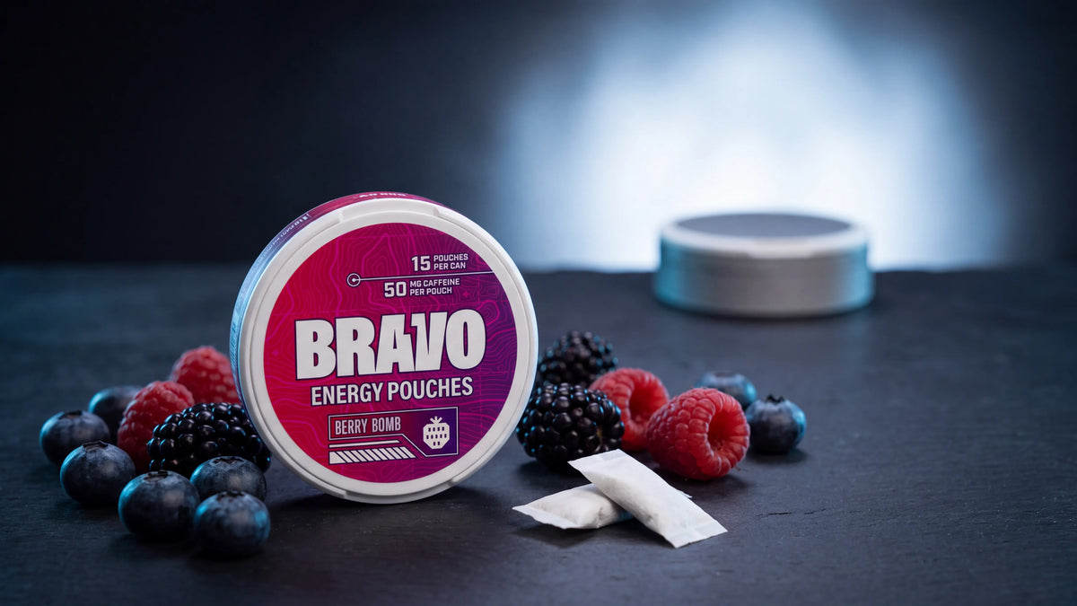 Bravo Berry Bomb caffeine pouch can with fresh berries, next to a generic unbranded competitor tin, for the Nitro Pouches review